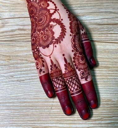 Dark Back Hand Mehndi Design