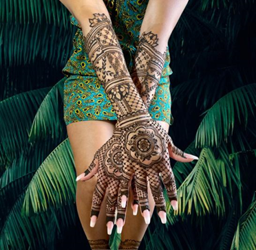 Elaborate Back Hand Mehndi Design