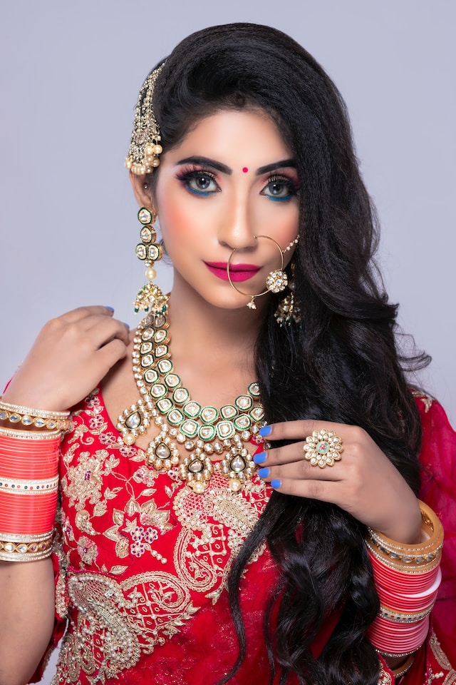 Beautiful young woman or girl in yellow saree posing with color or colour  or gulal or abeer or Holi powder in a decorated plate to celebrate holi  festival of colors Stock Photo |